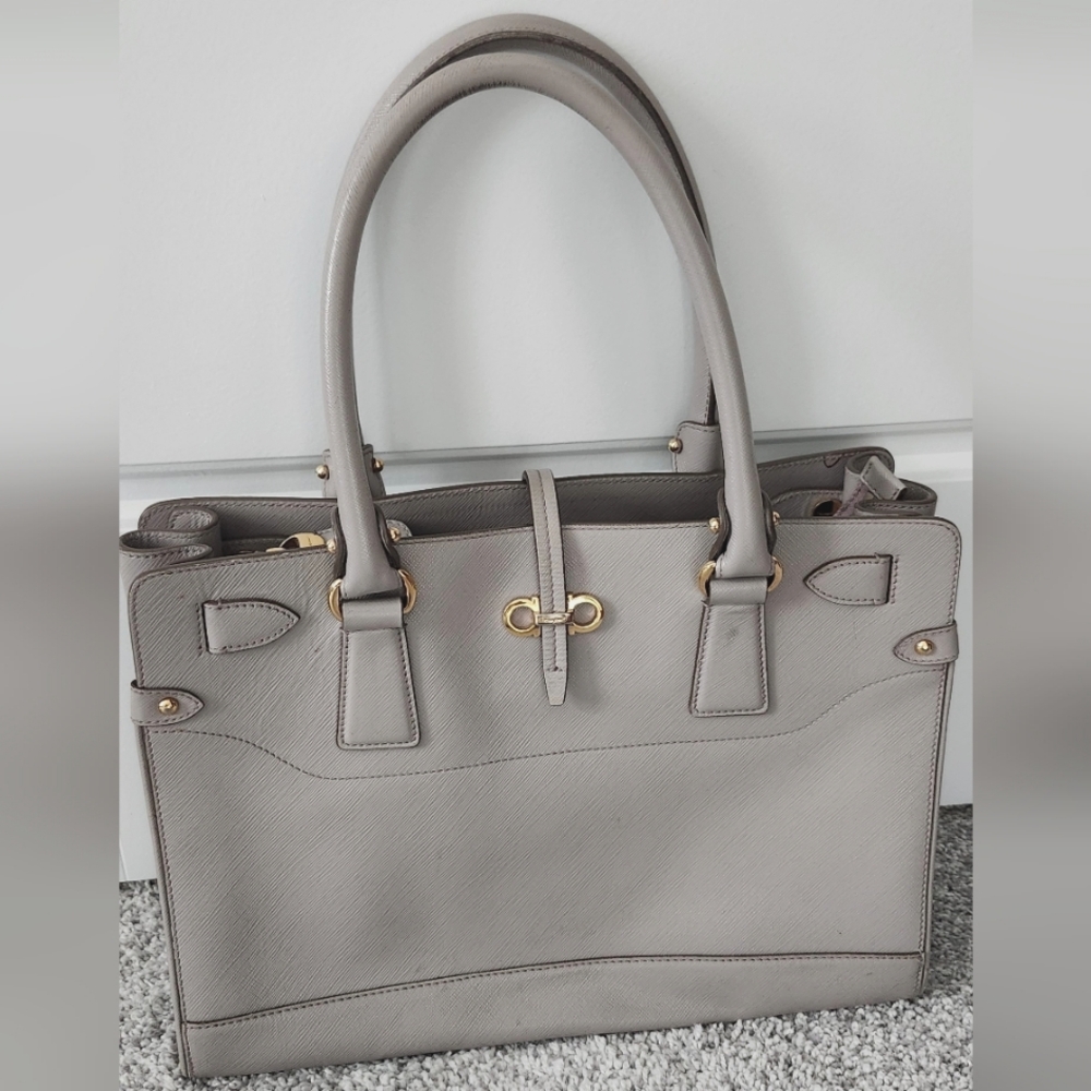 Authentic Salvatore Ferragamo tote in grey with gold accents